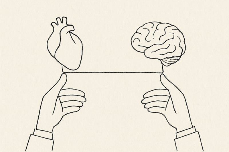 Um coração e um cérebro ligados por um fio equilibrado por mãos humanas, sugerindo que a inteligência emocional guia decisões e performance no trabalho.